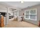 Spacious main bedroom with sitting area, carpet floors, tray ceiling, and abundant natural light at 905 Fox Croft Pl, Canton, GA 30114