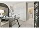 Inviting office space with a modern desk, plush seating, and a decorative shelving unit at 102 Holt Ln, Lawrenceville, GA 30046