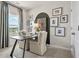Home office with a modern desk, comfortable seating, and stylish window treatments with a view at 102 Holt Ln, Lawrenceville, GA 30046