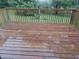 Outside deck view with wood planks and safety railing and wooded backdrop at 1170 Blair Bridge Rd, Austell, GA 30168