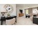 Comfortable living room showcasing a large sectional sofa, a round coffee table, and neutral tones at 1771 Jordan Brook Dr, Lawrenceville, GA 30043