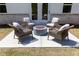 Inviting patio with comfortable seating around a fire pit, ideal for outdoor gatherings at 1771 Jordan Brook Dr, Lawrenceville, GA 30043