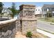 Street view of the brick and stone Riverside Ridge neighborhood sign at 1771 Jordan Brook Dr, Lawrenceville, GA 30043
