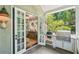 Back porch with a built in grill and food prep area at 20 S Prado Ne, Atlanta, GA 30309