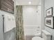 Cozy bathroom featuring a shower/tub with subway tile and a decorative shower curtain at 20 S Prado Ne, Atlanta, GA 30309