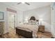 Comfortable bedroom with a ceiling fan and featuring a neutral palette with views of the backyard at 20 S Prado Ne, Atlanta, GA 30309