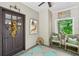 Inviting entryway featuring stylish decor, art and view to front porch at 20 S Prado Ne, Atlanta, GA 30309