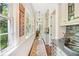 Hallway has large windows that provide natural light and charming views of the surrounding greenery at 20 S Prado Ne, Atlanta, GA 30309