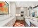 Bright kitchen with an island, stainless appliances, and convenient access to dining and living spaces at 20 S Prado Ne, Atlanta, GA 30309