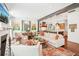 Open-concept living room with a fireplace, dining area, and kitchen at 20 S Prado Ne, Atlanta, GA 30309