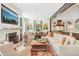 Open living area with a fireplace and view to kitchen at 20 S Prado Ne, Atlanta, GA 30309