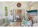 Relaxing covered porch boasts cozy seating and a serene ambiance, great for enjoying the outdoors at 20 S Prado Ne, Atlanta, GA 30309