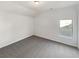 This is a standard bedroom with carpeted floors and a window for natural light at 4428 Belcamp Rd, Fairburn, GA 30213