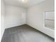 This is a standard bedroom with carpeted floors and a window for natural light at 4428 Belcamp Rd, Fairburn, GA 30213