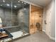 Modern bathroom with a glass-enclosed shower and sauna at 20 Rosemont Pkwy, Covington, GA 30016