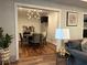 Charming dining room with stylish light fixture and hardwood floors at 20 Rosemont Pkwy, Covington, GA 30016
