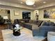 Elegant living room featuring a large sectional sofa and stylish decor at 20 Rosemont Pkwy, Covington, GA 30016