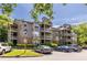 Attractive apartment building featuring multi-level balconies and ample parking in a well-landscaped setting at 405 Mcgill Park Ne Ave, Atlanta, GA 30312