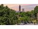 Scenic view of the cityscape beyond mature trees, offering a harmonious blend of urban and natural elements at 405 Mcgill Park Ne Ave, Atlanta, GA 30312