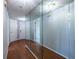 Hallway featuring mirrored closet doors and access to other rooms at 405 Mcgill Park Ne Ave, Atlanta, GA 30312