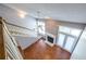 Living room boasting hardwood floors, a fireplace, and a large picture window at 405 Mcgill Park Ne Ave, Atlanta, GA 30312