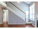 Living room with staircase, high ceilings, and natural light at 405 Mcgill Park Ne Ave, Atlanta, GA 30312