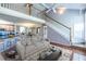 Bright living room with staircase, modern furniture, and open floor plan at 405 Mcgill Park Ne Ave, Atlanta, GA 30312