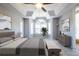 Beautifully decorated main bedroom with a large window for natural light and elegant furnishings at 405 Mcgill Park Ne Ave, Atlanta, GA 30312