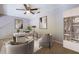 Office space with desk, sitting area, bookshelves, and overhead lighting at 405 Mcgill Park Ne Ave, Atlanta, GA 30312