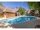 Exterior view of a pristine community pool surrounded by shade trees at 405 Mcgill Park Ne Ave, Atlanta, GA 30312