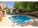 Community pool with lounge chairs and manicured landscaping at 405 Mcgill Park Ne Ave, Atlanta, GA 30312