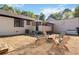 Spacious backyard with seating around a fire pit, perfect for entertaining Gathering and friends at 4264 Windward Ln, Norcross, GA 30093