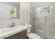 Sleek bathroom features elegant tile work, a modern vanity, and a glass-enclosed shower for a spa-like feel at 4264 Windward Ln, Norcross, GA 30093