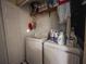 Functional laundry area equipped with a washer and dryer at 5607 Stonington Trace Pkwy, Stone Mountain, GA 30087