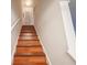 Beautiful hardwood staircase leading to the upper level of the home at 5607 Stonington Trace Pkwy, Stone Mountain, GA 30087