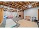 Spacious unfinished basement, ready to be customized with brick fireplace and ample room for activities at 751 Upper Burris Rd, Canton, GA 30114