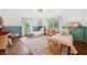 Bright bedroom with two twin beds, light hardwood floors and windows providing natural light at 751 Upper Burris Rd, Canton, GA 30114