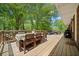 Outdoor deck with dining table, chairs, and grill perfect for entertaining at 751 Upper Burris Rd, Canton, GA 30114