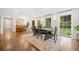 Bright dining room featuring hardwood floors, ample natural light, and space for entertaining at 751 Upper Burris Rd, Canton, GA 30114