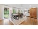 Bright and spacious dining room with hardwood floors and large windows at 751 Upper Burris Rd, Canton, GA 30114