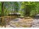 Exterior view of a home featuring a barn and rustic surroundings at 751 Upper Burris Rd, Canton, GA 30114