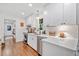 Beautiful kitchen with stainless steel appliances, quartz countertops, and ample storage at 751 Upper Burris Rd, Canton, GA 30114