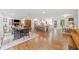 Open concept living area featuring hardwood floors and fireplace, flowing into the kitchen at 751 Upper Burris Rd, Canton, GA 30114