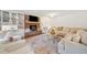 Cozy living room with a brick fireplace, built-in bookshelves, plush seating, and a stylish area rug at 751 Upper Burris Rd, Canton, GA 30114