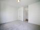 Bedroom boasting neutral color carpet and two closets at 1432 Fairmont Ave, Atlanta, GA 30318