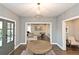 Welcoming foyer with an open floor plan, offering views of the living and dining areas at 1432 Fairmont Ave, Atlanta, GA 30318