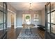 Beautifully designed foyer with hardwood floors, modern lighting, and stylish decor at 1432 Fairmont Ave, Atlanta, GA 30318