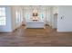 Spacious kitchen flows into the living room, and includes a large island and stainless appliances at 1432 Fairmont Ave, Atlanta, GA 30318