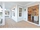 View of a covered porch area looking inside at an open kitchen at 1432 Fairmont Ave, Atlanta, GA 30318