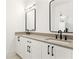 Elegant bathroom featuring a double vanity with modern sinks, and a sleek minimalist mirror at 1585 S Ponce De Leon Ne Ave # 19, Atlanta, GA 30307